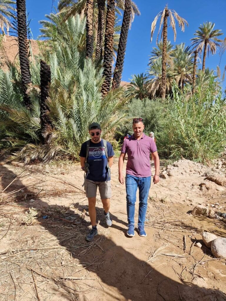 Ibrahim guiding visitors during a Morocco travel experience